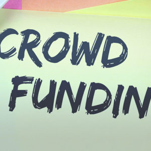 Crowd Funding written on a post it note