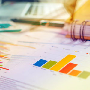 Graphs and charts, business table. The workplace of business people.