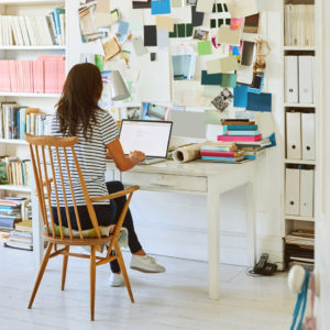 Pregnant woman working at home