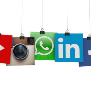 Social media icons hanging on strings