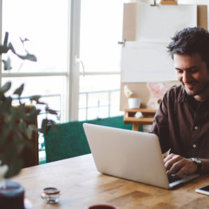 Young man working at home