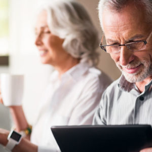 Elderly couple discussing their superannuation and retirement plans