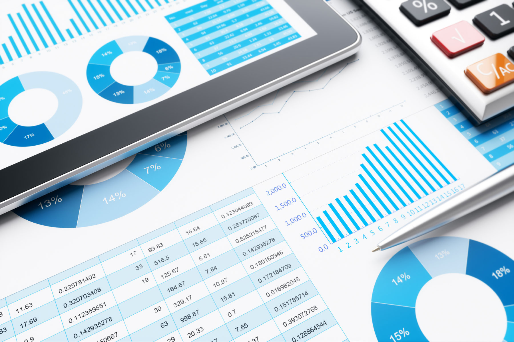 business report and laptop on desk - superannuation concept