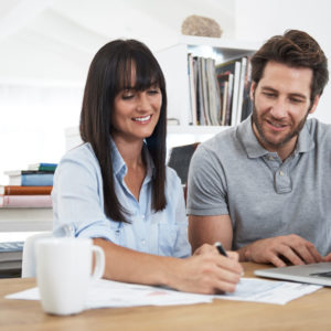 Couple reviewing their investment and budgeting plans