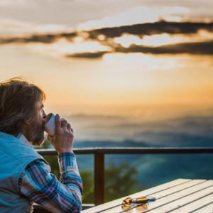 Retired man drinking a coffee