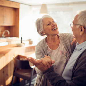 retired senior couple dancing